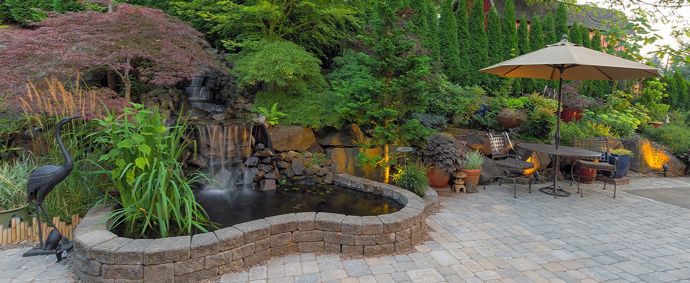 Backyard Landscaping Patio with Waterfall Pond